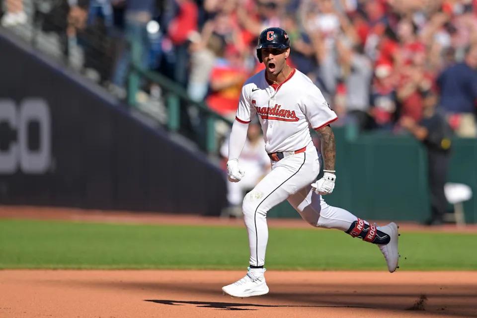 Oct 1, 2025; Cleveland, Ohio, USA; Cleveland Guardians shortstop Brayan Rocchio (4) celebrates after scoring a home run in the eighth inning against the Detroit Tigers during game two of the Wildcard round for the 2025 MLB playoffs at Progressive Field. Mandatory Credit: Ken Blaze-Imagn Images