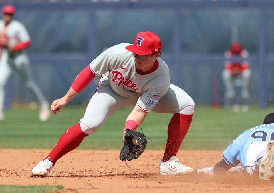 Feb 25, 2025; Port Charlotte, Florida, USA; Tampa Bay Rays outfielder Chandler Simpson (96) slides safely into second base against Philadelphia Phillies infielder Aidan Miller (81) at Charlotte Sports Park. Mandatory Credit: Kim Klement Neitzel-Imagn Images