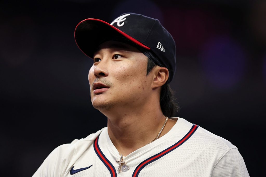 Atlanta Braves shortstop Ha-Seong Kim reacts during a baseball game.