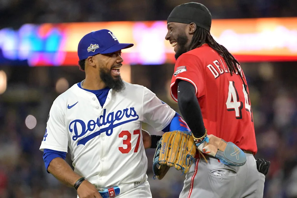 Cincinnati Reds shortstop Elly De La Cruz (44) and Los Angeles Dodgers outfielder Teoscar Hernandez (37). © Jayne Kamin-Oncea-Imagn Images