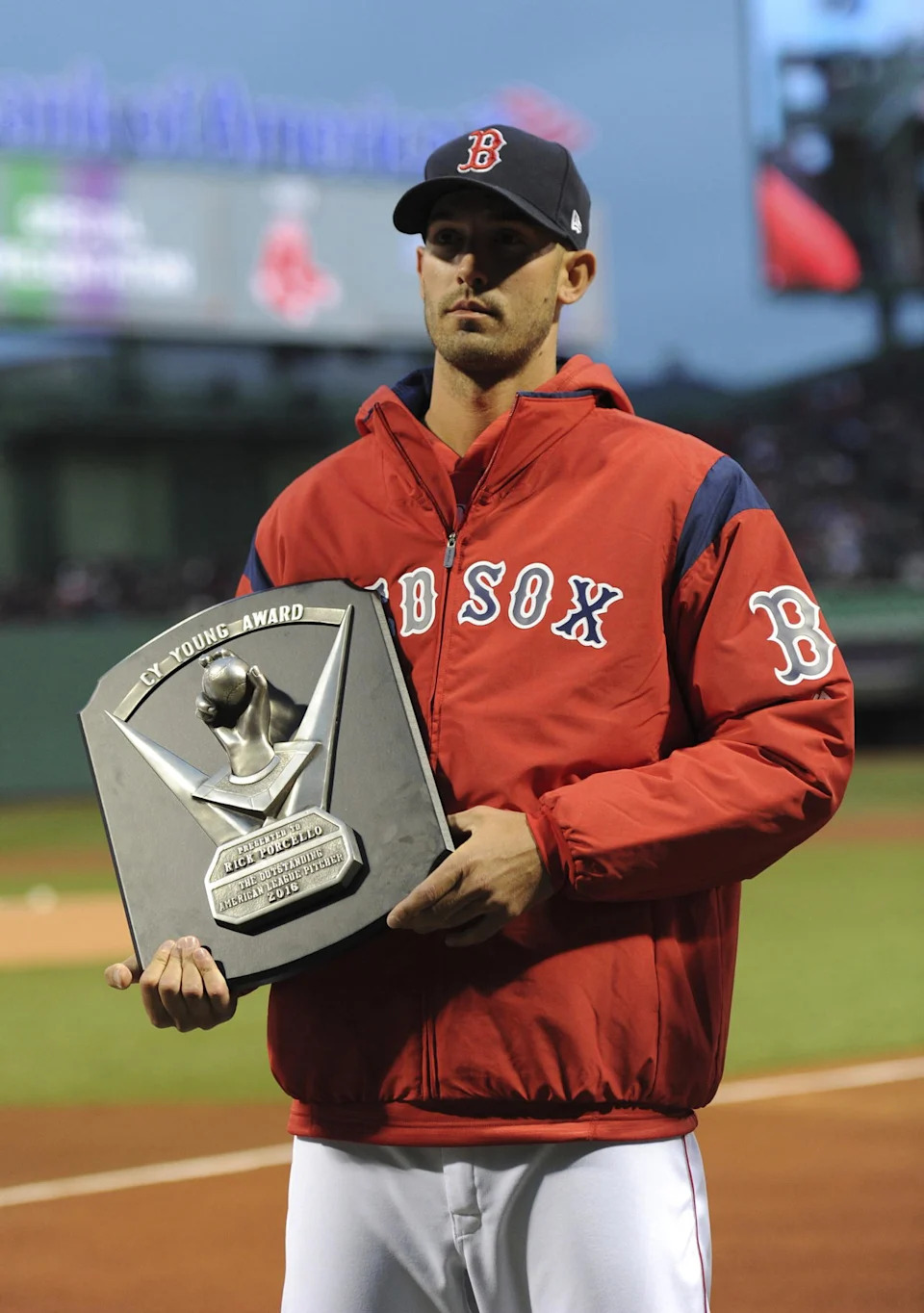 Apr 5, 2017; Boston, MA, USA; Boston Red Sox starting pitcher Rick Porcello (22) is honored with the Cy Young Award prior to a game against the Pittsburgh Pirates at Fenway Park. (Bob DeChiara/Imagn Images)