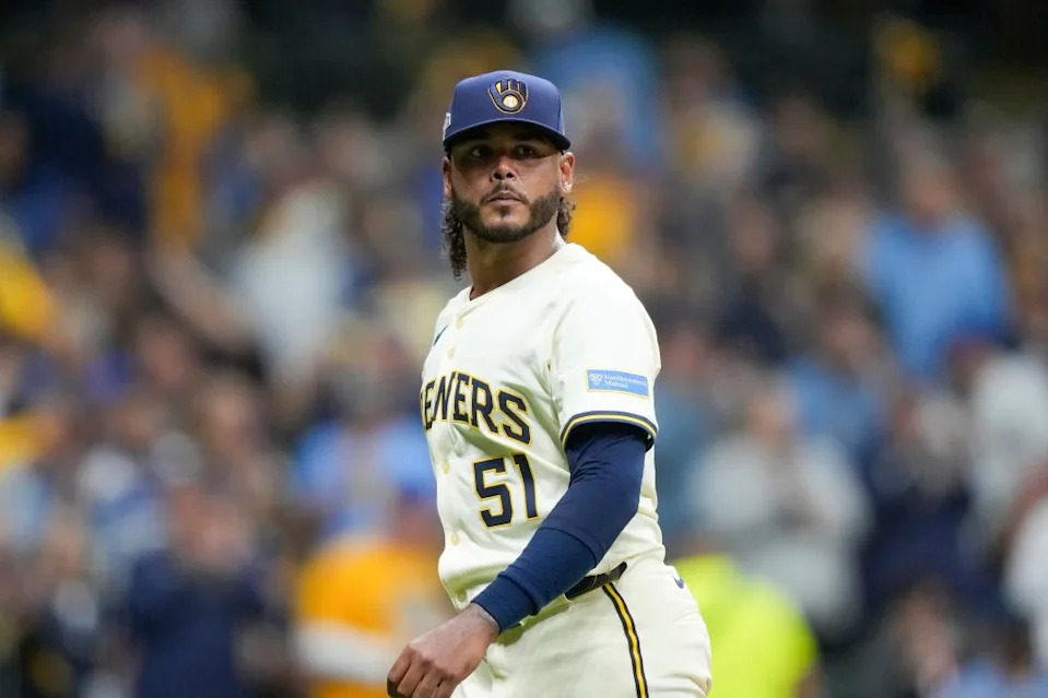 Milwaukee Brewers pitcher Freddy Peralta walks to the dugout after the top of the fifth inning in Game 2 of baseball’s National League Championship Series against the Los Angeles Dodgers, Tuesday, Oct. 14, 2025, in Milwaukee. AP