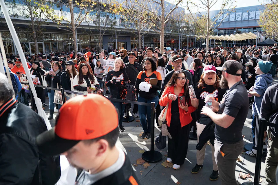 Fans line up to have memorabilia signed by outfielder Jung Hoo Lee and Landen Roupp during the San Francisco Giants Fanfest at Bishop Ranch in San Ramon on Saturday. (Don Feria/For the S.F. Chronicle)