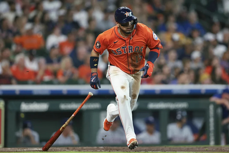 Jul 11, 2025; Houston, Texas, USA; Houston Astros third baseman Isaac Paredes (15) hits a single during the first inning against the Texas Rangers at Daikin Park. (Troy Taormina/Imagn Images)
