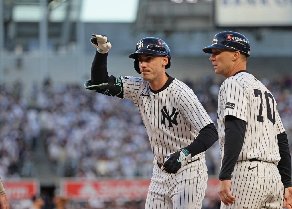 Cody Bellinger #35 of the New York Yankees reacts after hitting a single during the first inning.