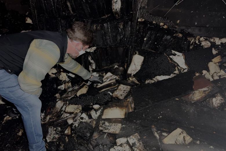 Temple President Zach Shemper showed CNN damage to the library inside the Beth Israel Synagogue three days after the building was burned on January 10.