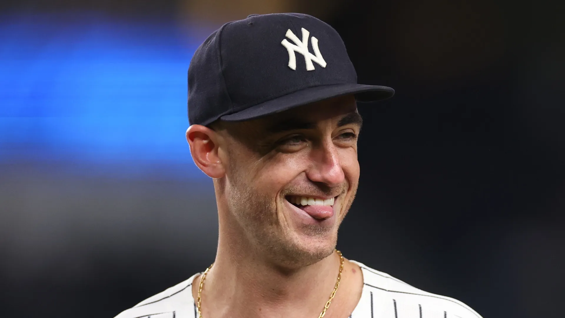 Cody Bellinger smiles during a Yankees game.