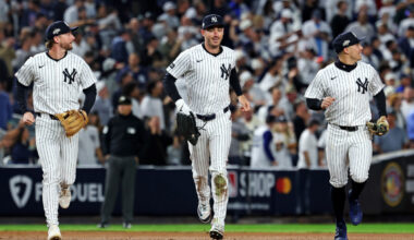 Oct 8, 2025; Bronx, New York, USA; New York Yankees left fielder Cody Bellinger (35) runs off the field after ending the first inning with a sliding catch against the Toronto Blue Jays during game four of the ALDS round for the 2025 MLB playoffs at Yankee Stadium. Mandatory Credit: Vincent Carchietta-Imagn Images