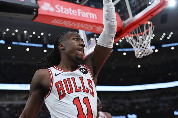 Chicago Bulls' Ayo Dosunmu, a noted Chicago Bears fan, celebrates after making a basket against the Dallas Mavericks on Saturday, Jan. 10, 2026, at the United Center. (AP Photo/Paul Beaty)