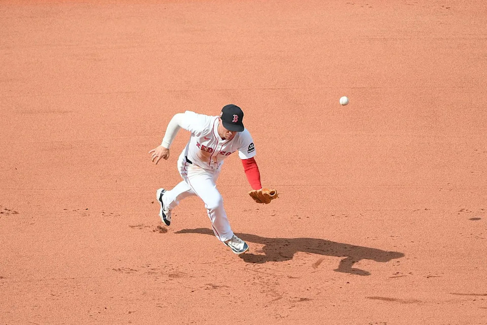 Aug 17, 2025; Boston, Massachusetts, USA; Boston Red Sox third baseman Alex Bregman (2) bobbles a ground ball during the ninth inning against the Miami Marlins at Fenway Park. (Bob DeChiara/Imagn Images)