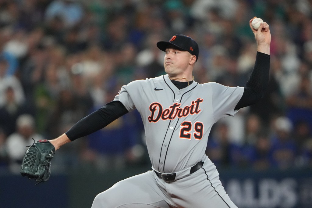 Detroit Tigers pitcher Tarik Skubal mid-throw in a baseball game.