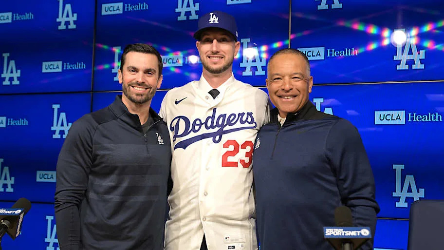 Dave Roberts, Brandon Gomes and Kyle Tucker of Los Angeles Dodgers.