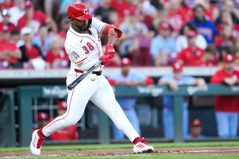 Cincinnati Reds designated hitter Miguel Andujar (38) hits a single in the first inning of a MLB game between the Cincinnati Reds and St. Louis Cardinals, Aug. 30, 2025, at Great American Ball Park in downtown Cincinnati. © Frank Bowen IV/The Enquirer / USA TODAY NETWORK via Imagn Images