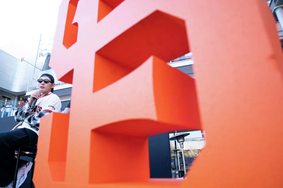 Giants outfielder Jung Hoo Lee answers interview questions during the San Francisco Giants Fanfest at Bishop Ranch in San Ramon on Saturday. (Don Feria/For the S.F. Chronicle)