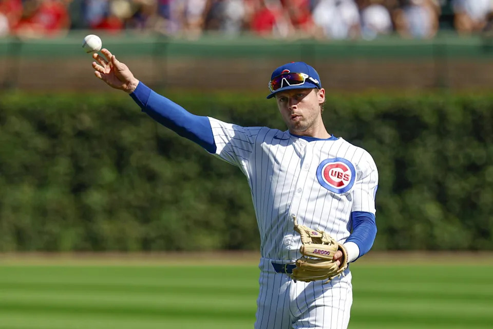 Sep 27, 2025; Chicago, Illinois, USA; Chicago Cubs second baseman Nico Hoerner (2) warms up before a baseball game against the St. Louis Cardinals at Wrigley Field. (Kamil Krzaczynski/Imagn Images)