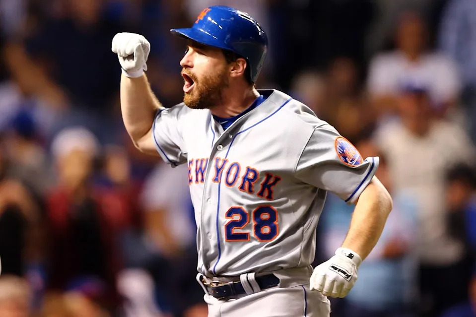 Daniel Murphy of the New York Mets celebrates after hitting a two run home run in the eighth inning against Fernando Rodney of the Chicago Cubs during game four of the 2015 MLB National League Championship Series at Wrigley Field on October 21, 2015 in Chicago, Illinois. Getty Images