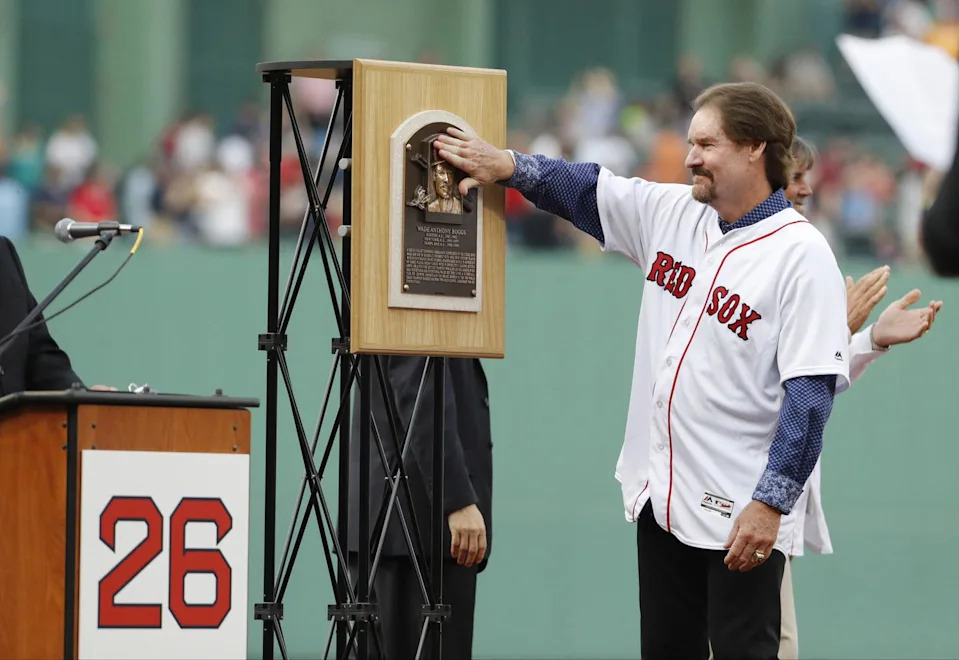 May 26, 2016; Boston, MA, USA; Former Red Sox player Wade Boggs is honored with the retiring of his uniform number 26 before the start of the game against the Colorado Rockies at Fenway Park. (David Butler II/Imagn Images)