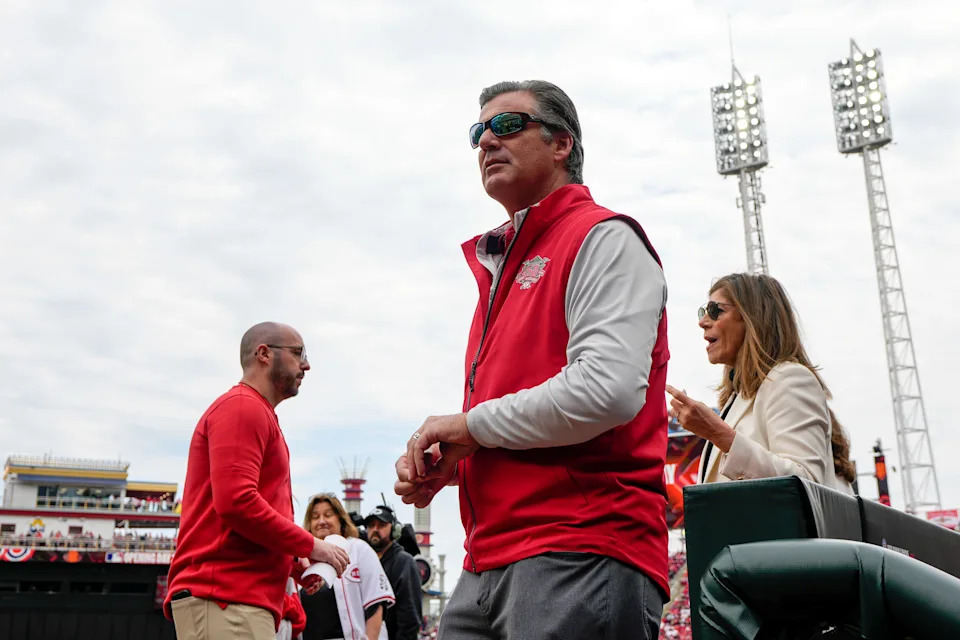 Cincinnati Reds president and CEO Phil Castellini stands on the field before the first inning of the MLB Opening Day game between the Cincinnati Reds and the San Francisco Giants at Great American Ball Park in downtown Cincinnati on Thursday, March 27, 2025. The Reds led 3-0 after three innings.