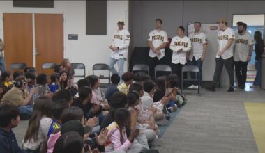 San Diego Padres surprise students and seniors with books during community tour ahead of FanFest