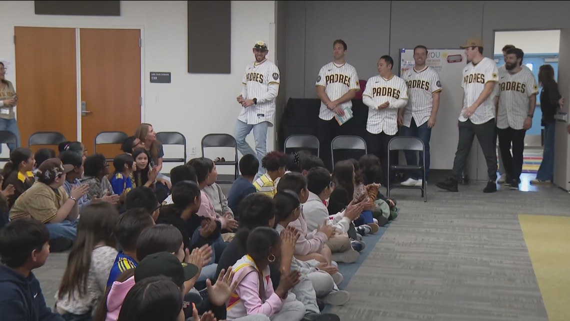 San Diego Padres surprise students and seniors with books during community tour ahead of FanFest