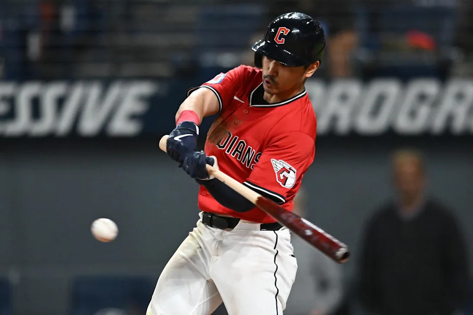 Aug 30, 2025; Cleveland, Ohio, USA; Cleveland Guardians left fielder Steven Kwan (38) hits an RBI single during the eighth inning against the Seattle Mariners at Progressive Field. Mandatory Credit: Ken Blaze-Imagn Images