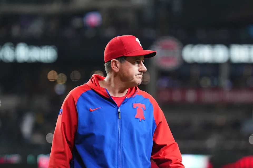 Sep 20, 2025; Phoenix, Arizona, USA; Philadelphia Phillies manager Rob Thomson (49) looks on against the Arizona Diamondbacks during the sixth inning at Chase Field. Mandatory Credit: Joe Camporeale-Imagn Images
