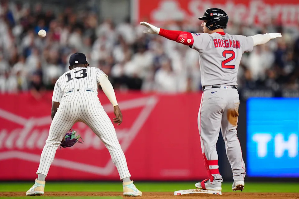 NEW YORK, NY - SEPTEMBER 30:   Alex Bregman #2 of the Boston Red Sox reacts after hitting a one-run double in the ninth inning during Game One of the American League Wild Card Series between the Boston Red Sox and the New York Yankees at Yankee Stadium on Tuesday, September 30, 2025 in New York, New York. (Photo by Daniel Shirey/MLB Photos via Getty Images)