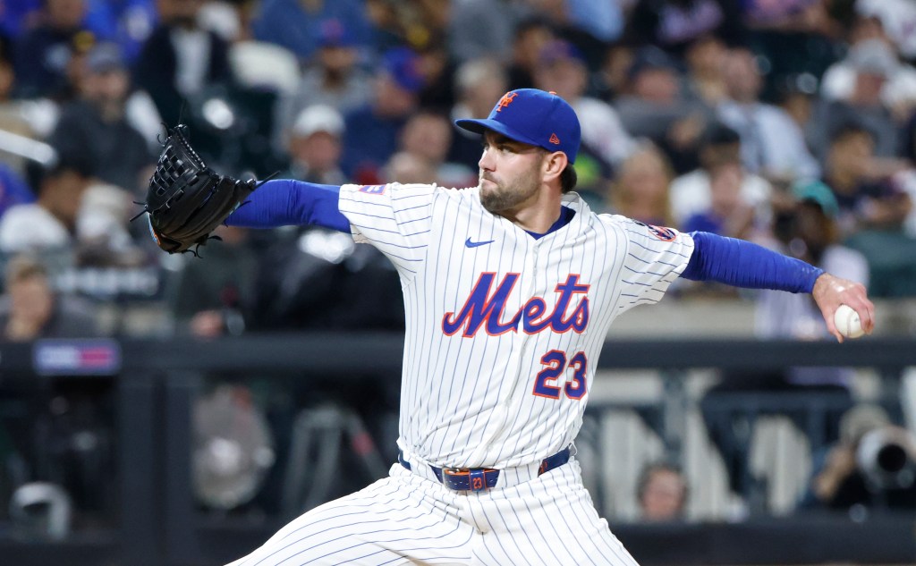 New York Mets pitcher David Peterson throwing a pitch.
