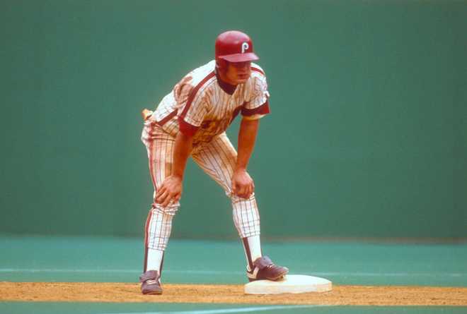 Philadelphia Phillies PHILADELPHIA, PA - CIRCA 1990: Lenny Dykstra #4 of the Philadelphia Phillies looks on while standing on second base during an Major League Baseball game circa 1990 at Veterans Stadium in Philadelphia, Pennsylvania. Dykstra played for the Phillies from 1989-96. (Photo by Focus on Sport/Getty Images)