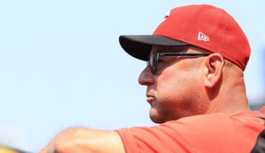 Reds skipper Francona takes in UC game against Arizona courtside