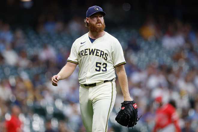 MILWAUKEE, WISCONSIN - SEPTEMBER 17: Brandon Woodruff #53 of the Milwaukee Brewers looks on during the game against the Los Angeles Angels at American Family Field on September 17, 2025 in Milwaukee, Wisconsin. (Photo by John Fisher/Getty Images)