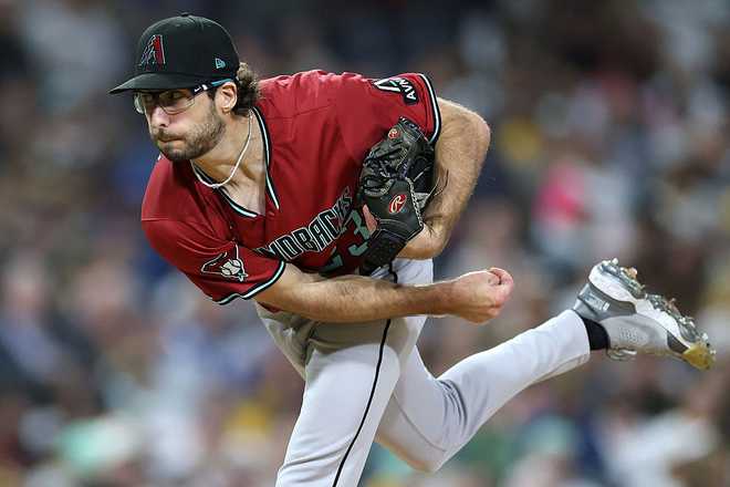 SAN DIEGO, CALIFORNIA - SEPTEMBER 26: Zac Gallen #23 of the Arizona Diamondbacks pitches during the first inning of a game against the San Diego Padres at Petco Park on September 26, 2025 in San Diego, California. (Photo by Sean M. Haffey/Getty Images)