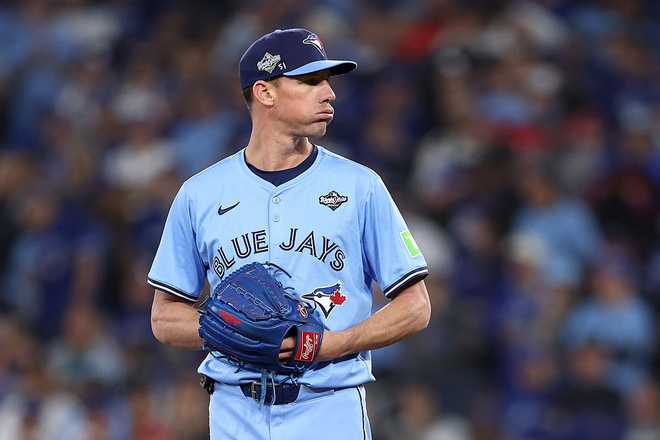 TORONTO, ONTARIO - OCTOBER 31: Chris Bassitt #40 of the Toronto Blue Jays pitches against the Los Angeles Dodgers during the ninth inning in game six of the 2025 World Series at Rogers Center on October 31, 2025 in Toronto, Ontario.  (Photo by Emilee Chinn/Getty Images)