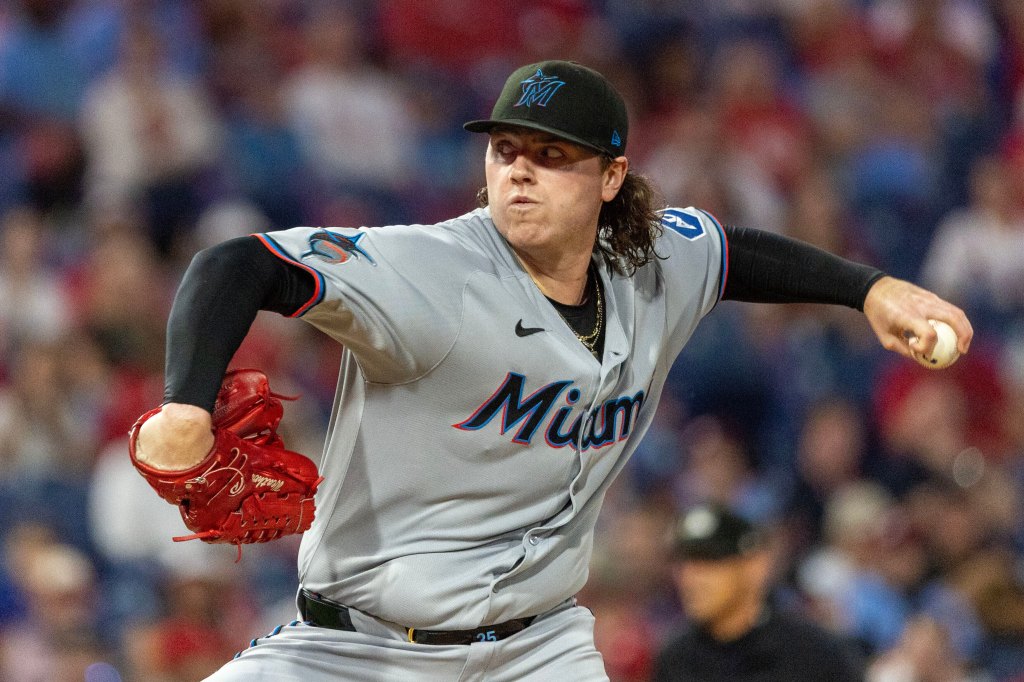 Miami Marlins pitcher Ryan Weathers pitching during a baseball game.