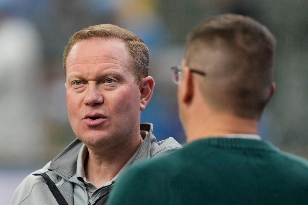 Milwaukee Brewers general manager Matt Arnold speaking to someone off-camera.