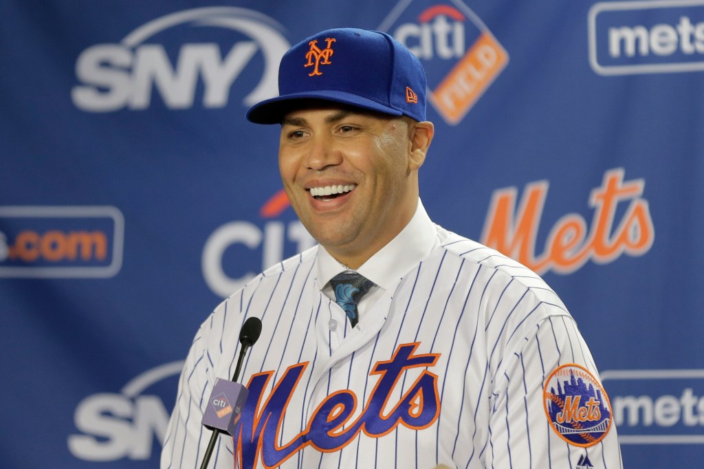 Mets' Carlos Beltran smiles during an introductory baseball news conference in New York, Nov. 4, 2019.