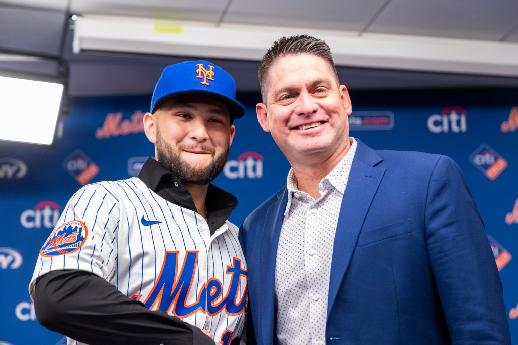 New York Mets infielder Bo Bichette and manager Carlos Mendoza pose for a photo.