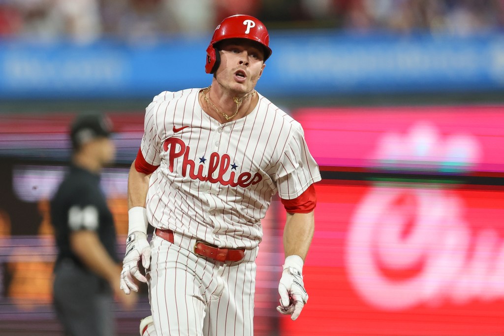 Philadelphia Phillies left fielder Max Kepler (17) runs to third base after hitting a triple against the Los Angeles Dodgers in the eighth inning during game two of the NLDS round for the 2025 MLB playoffs at Citizens Bank Park. 