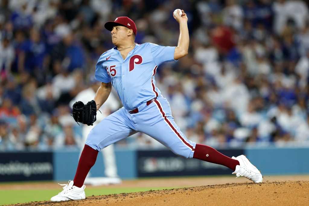 Philadelphia Phillies pitcher Ranger Suárez mid-delivery in a game against the Los Angeles Dodgers.