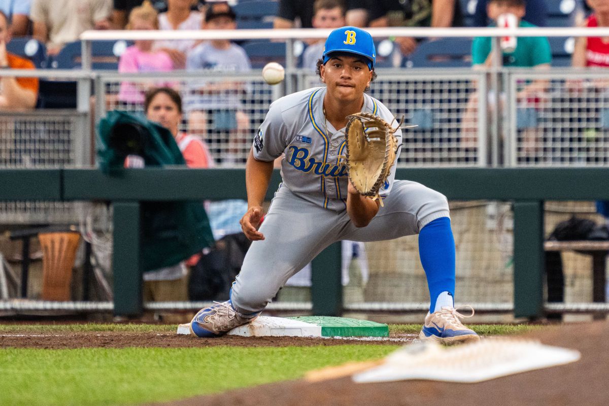 UCLA Bruins first baseman Mulivai Levu (39) catches for an out against the Arkansas Razorbacks during the first inning at Charles Schwab Field.
