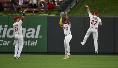 Sep 2, 2025; St. Louis, Missouri, USA;  St. Louis Cardinals outfielder Lars Nootbaar (21) center fielder Victor Scott II (11) and right fielder Nathan Church (27) celebrate after the Cardinals defeated the Athletics at Busch Stadium. Mandatory Credit: Jeff Curry-Imagn Images