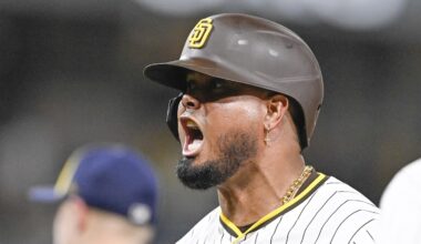 Sep 22, 2025; San Diego, California, USA; San Diego Padres first baseman Luis Arraez (4) celebrates after hitting an RBI single during the seventh inning against the Milwaukee Brewers at Petco Park. Mandatory Credit: Denis Poroy-Imagn Images