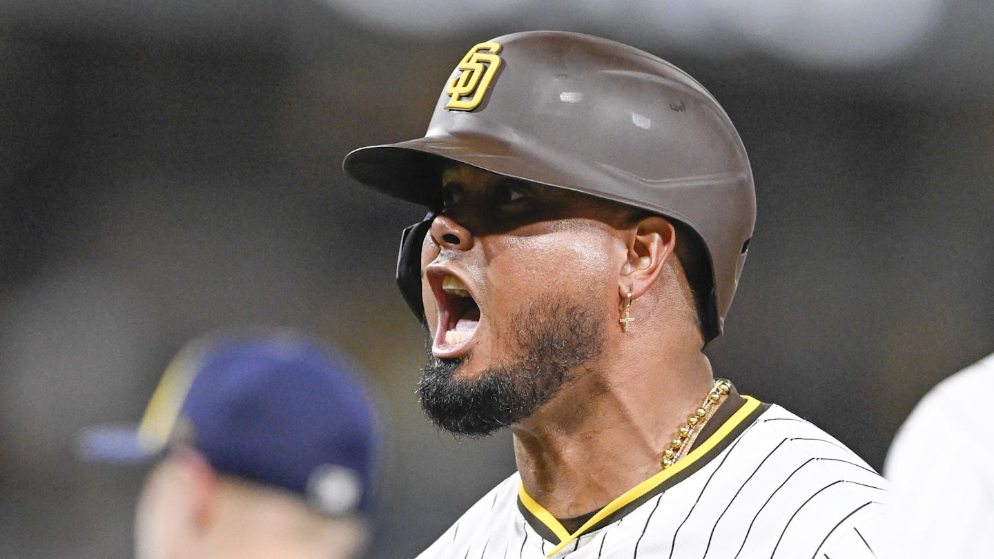 Sep 22, 2025; San Diego, California, USA; San Diego Padres first baseman Luis Arraez (4) celebrates after hitting an RBI single during the seventh inning against the Milwaukee Brewers at Petco Park. Mandatory Credit: Denis Poroy-Imagn Images