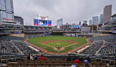 Jun 26, 2025; Minneapolis, Minnesota, USA; Sparsely seated fans watch the Seattle Mariners play the Minnesota Twins in the seventh inning after a nearly four and a half hour rain delay at Target Field. Mandatory Credit: Bruce Kluckhohn-Imagn Images