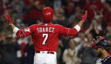 Sep 24, 2021; Cincinnati, Ohio, USA; Cincinnati Reds third baseman Eugenio Suarez (7) reacts after hitting a two-run home run against the Washington Nationals during the sixth inning at Great American Ball Park. Mandatory Credit: David Kohl-Imagn Images