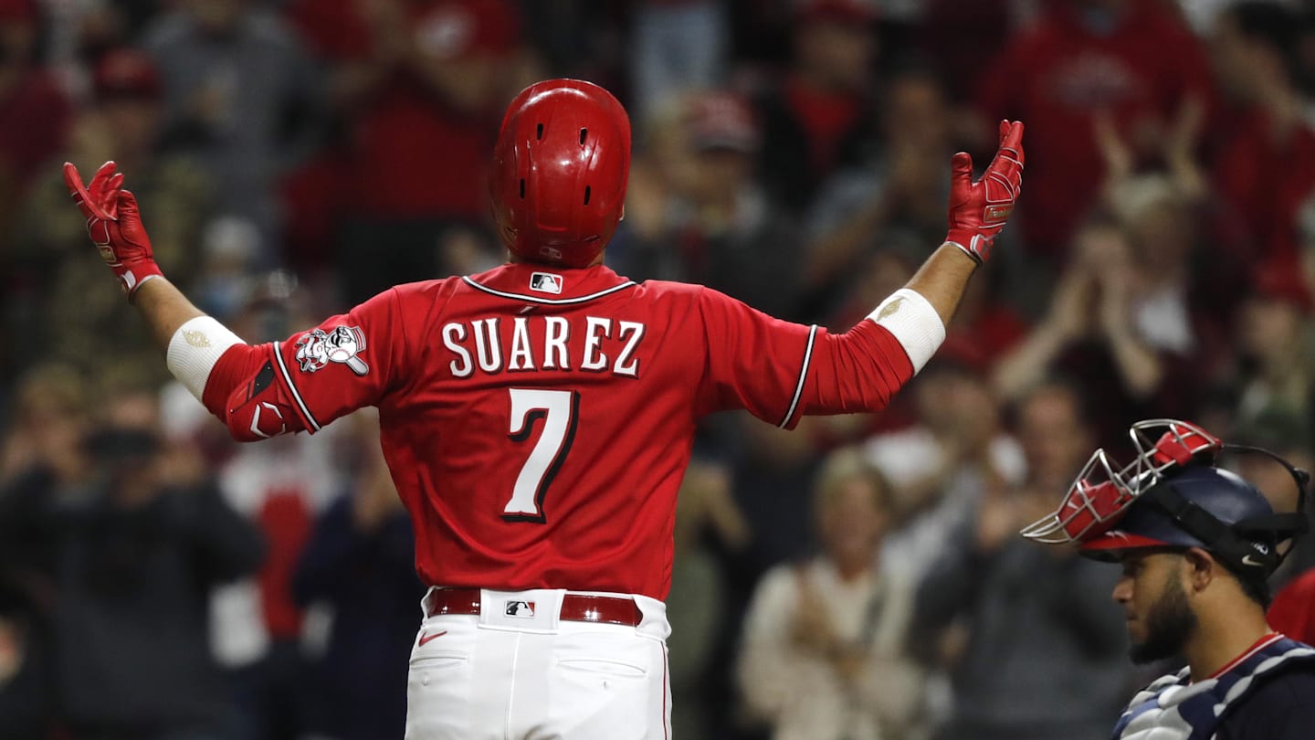 Sep 24, 2021; Cincinnati, Ohio, USA; Cincinnati Reds third baseman Eugenio Suarez (7) reacts after hitting a two-run home run against the Washington Nationals during the sixth inning at Great American Ball Park. Mandatory Credit: David Kohl-Imagn Images