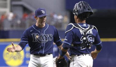 Sep 22, 2021; St. Petersburg, Florida, USA; Tampa Bay Rays relief pitcher David Robertson (30) and Tampa Bay Rays catcher Francisco Mejia (28) celebrate as they beat the Toronto Blue Jays to clinch a playoff spot at Tropicana Field. Mandatory Credit: Kim Klement-Imagn Images