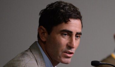 San Diego Padres general manager AJ Preller (left) speaks to the media