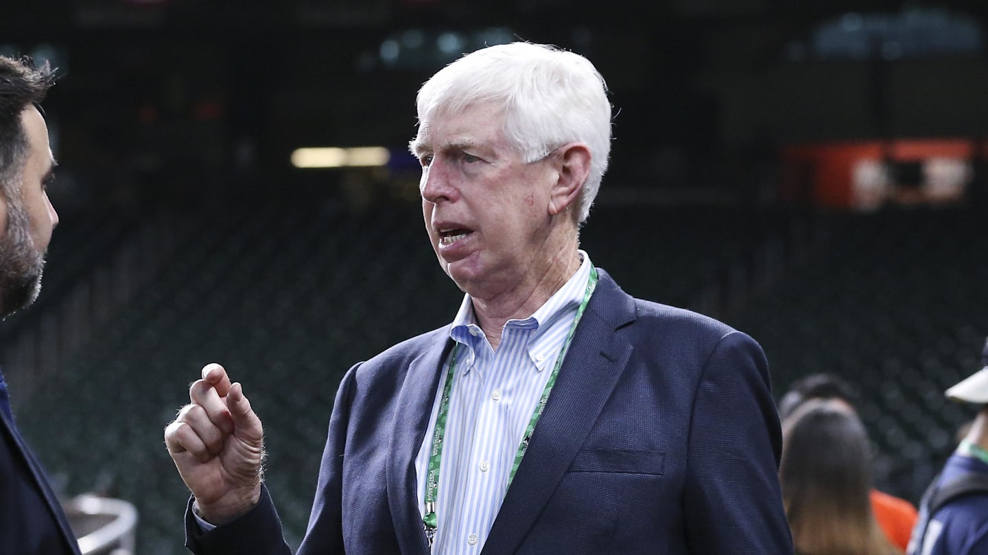 Oct 25, 2021; Houston, Texas, USA;  Atlanta Braves chairman Terry McGuirk (right) talks with general manager Alex Anthopoulos (left) during workouts before Game 1 of the World Series between the Houston Astros and the Atlanta Braves at Minute Maid Park. Mandatory Credit: Troy Taormina-Imagn Images
