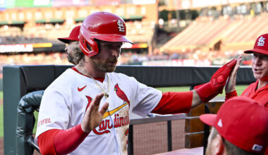 Jul 10, 2025; St. Louis, Missouri, USA;  St. Louis Cardinals second baseman Brendan Donovan (33) is congratulated by teammates after scoring against the Washington Nationals during the third inning at Busch Stadium. Mandatory Credit: Jeff Curry-Imagn Images